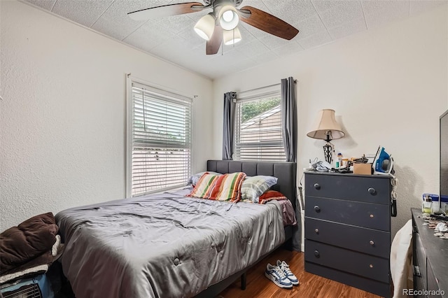 6736 Grove St, Denver, CO 80221 - bedroom featuring wood finished floors and a ceiling fan