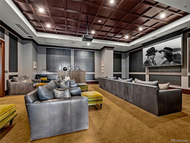 carpeted cinema room featuring coffered ceiling and ornamental molding