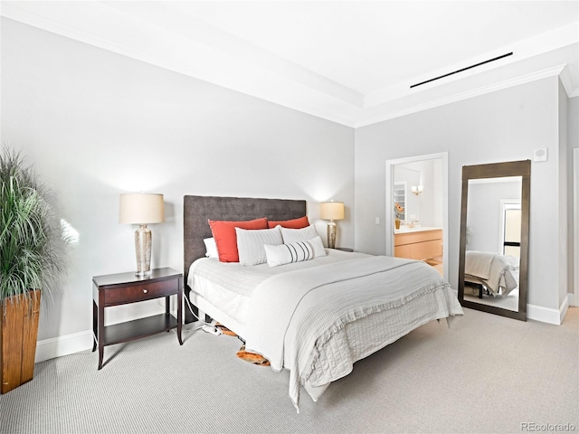 carpeted bedroom featuring connected bathroom