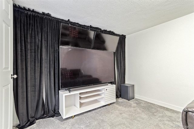 unfurnished living room with a textured ceiling and light colored carpet