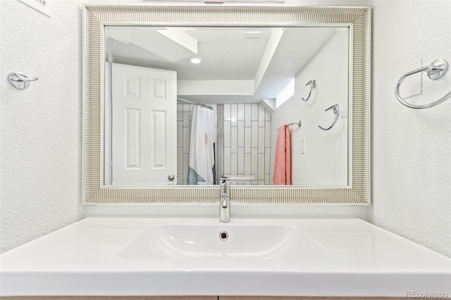 bathroom featuring a textured ceiling