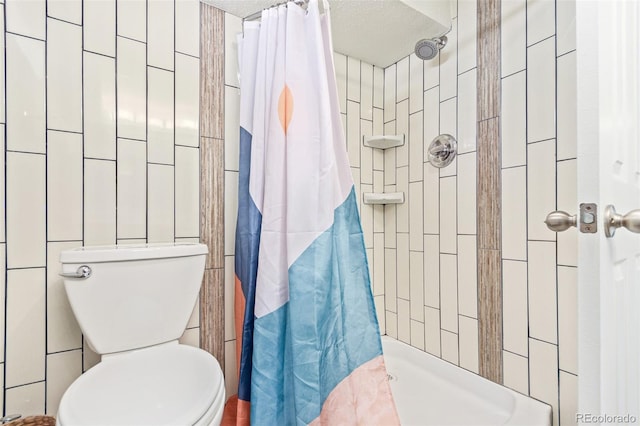 bathroom featuring tile walls, a textured ceiling, toilet, and a shower with shower curtain