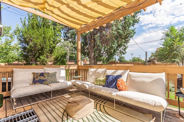 wooden deck featuring outdoor lounge area