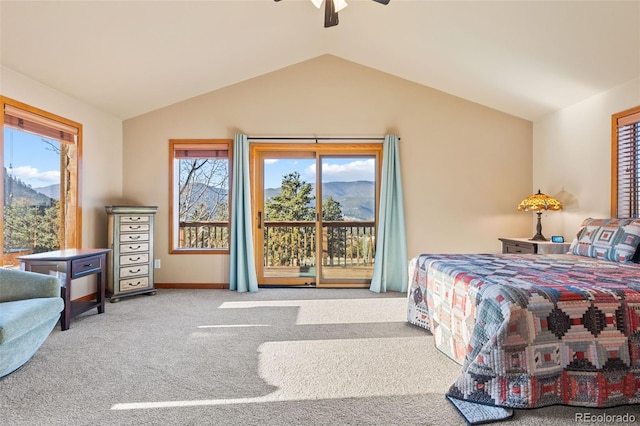 bedroom featuring multiple windows, carpet floors, ceiling fan, and vaulted ceiling