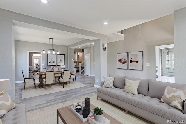 2901 Madison Ln, Broomfield, CO 80023 - living area with light wood finished floors, baseboards, and recessed lighting