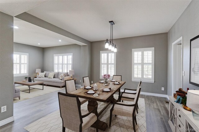 2901 Madison Ln, Broomfield, CO 80023 - dining area featuring wood finished floors, baseboards, and recessed lighting