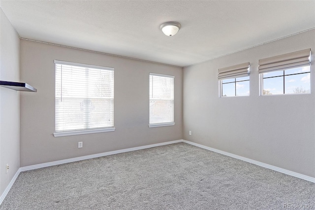 2901 Madison Ln, Broomfield, CO 80023 - carpeted empty room featuring baseboards
