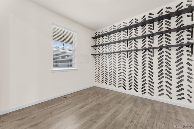 unfurnished room featuring light wood-type flooring