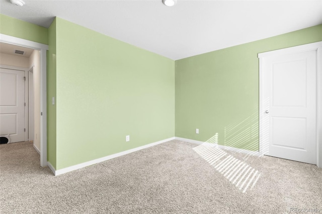 unfurnished bedroom with carpet floors