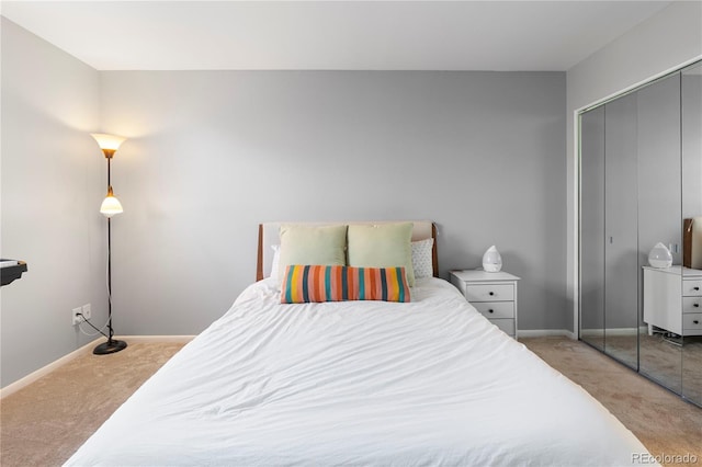 carpeted bedroom featuring a closet