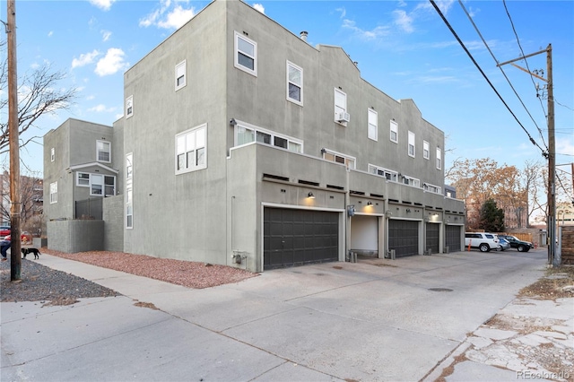 view of property exterior featuring a garage