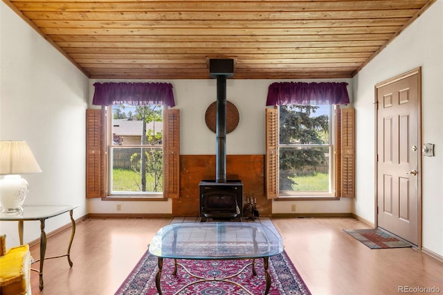 1908 Valley View Dr, Woodland Park, CO 80863 - living room featuring wood ceiling, wood finished floors, and a wood stove