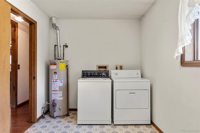 1908 Valley View Dr, Woodland Park, CO 80863 - washroom with gas water heater, independent washer and dryer, and light flooring