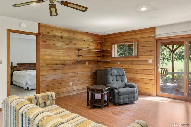 1908 Valley View Dr, Woodland Park, CO 80863 - living area with a ceiling fan, wood finished floors, wooden walls, and recessed lighting