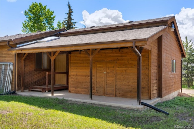 1908 Valley View Dr, Woodland Park, CO 80863 - rear view of house featuring a shingled roof