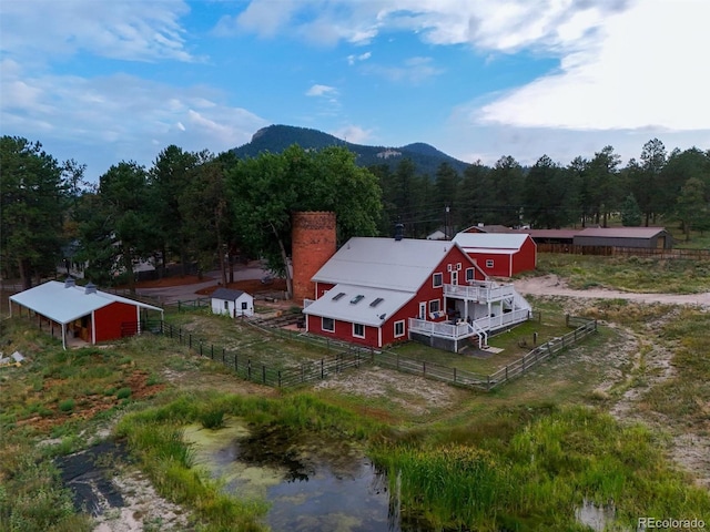 233 Perry Park Ave, Larkspur, CO 80118 - aerial view of property and surrounding area featuring a mountainous background