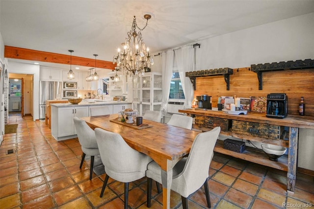 233 Perry Park Ave, Larkspur, CO 80118 - dining space with a chandelier