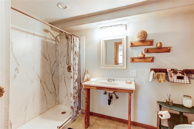 233 Perry Park Ave, Larkspur, CO 80118 - full bathroom featuring a marble finish shower and tile patterned floors
