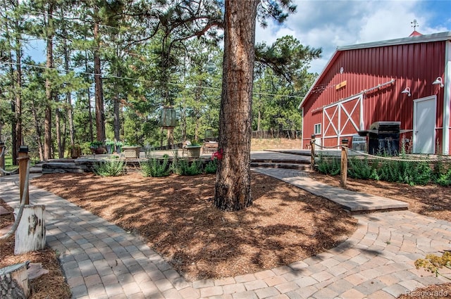 233 Perry Park Ave, Larkspur, CO 80118 - view of yard featuring a barn and an outbuilding