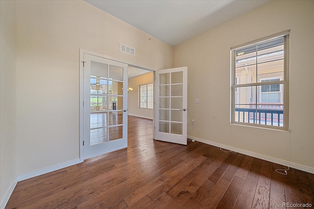 1130 Summit View Dr, Louisville, CO 80027 - unfurnished room with french doors, hardwood / wood-style floors, and baseboards