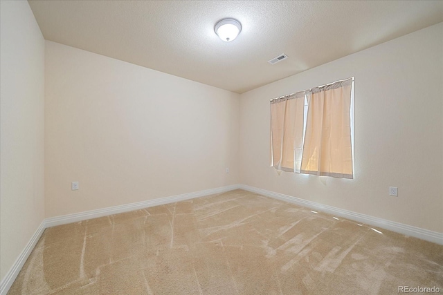 1130 Summit View Dr, Louisville, CO 80027 - unfurnished room featuring carpet flooring, baseboards, and a textured ceiling