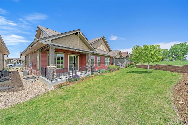 1130 Summit View Dr, Louisville, CO 80027 - view of side of home featuring a lawn and central AC unit