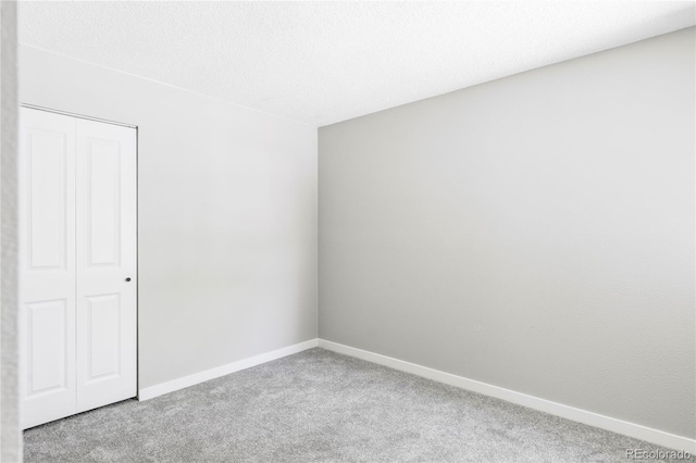 3328 S Danube St, Aurora, CO 80013 - empty room featuring carpet and baseboards