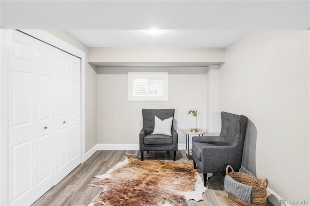 3328 S Danube St, Aurora, CO 80013 - sitting room featuring light wood-type flooring and baseboards