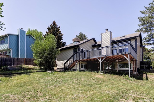 3328 S Danube St, Aurora, CO 80013 - back of house with a deck and stairway