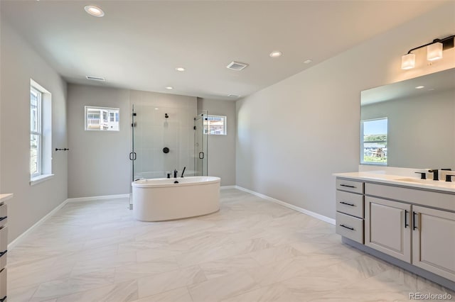 4748 Weitbrec Ln, Castle Rock, CO 80104 - bathroom featuring vanity, a stall shower, baseboards, recessed lighting, and a soaking tub