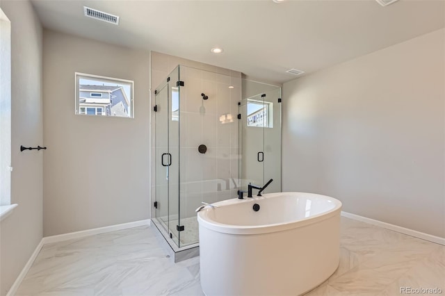 4748 Weitbrec Ln, Castle Rock, CO 80104 - full bath featuring a soaking tub, a shower stall, marble finish floors, recessed lighting, and baseboards
