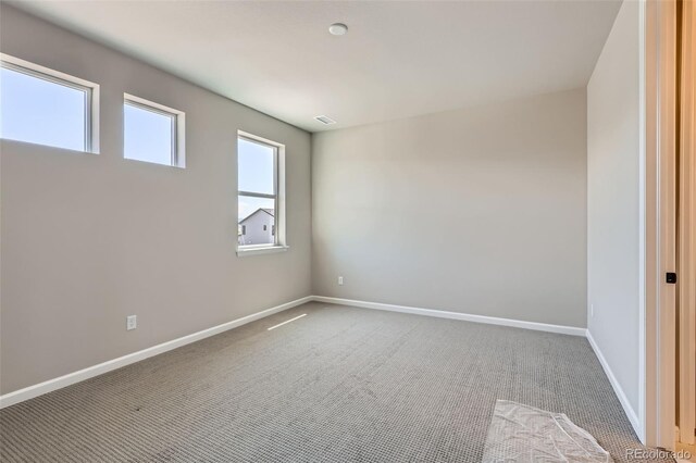 4748 Weitbrec Ln, Castle Rock, CO 80104 - spare room with baseboards and carpet