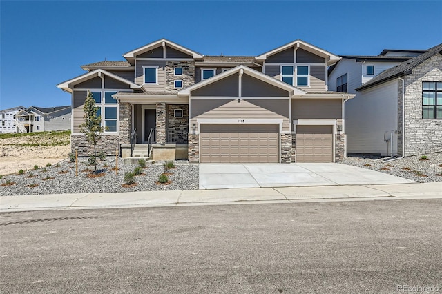 4748 Weitbrec Ln, Castle Rock, CO 80104 - view of front of home featuring stone siding, driveway, and an attached garage