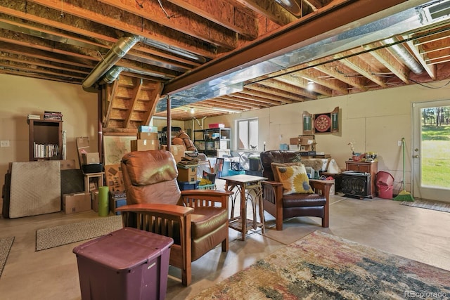 below grade area featuring a wood stove