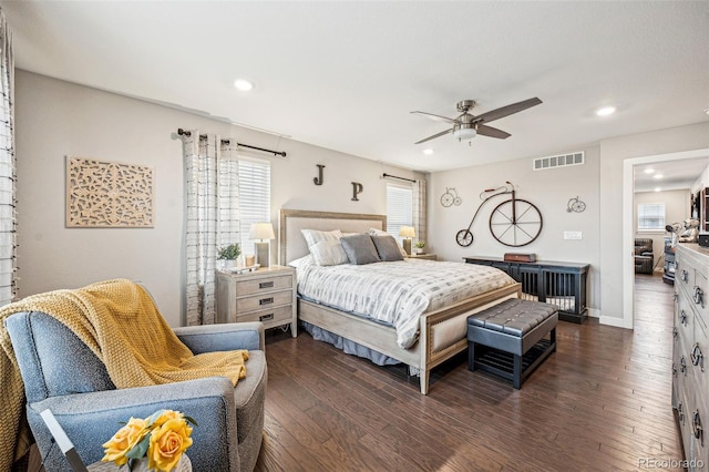 bedroom featuring dark wood-type flooring, a ceiling fan, visible vents, and recessed lighting