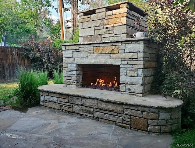 732 Poplar St, Denver, CO 80220 - detailed view of an outdoor stone fireplace