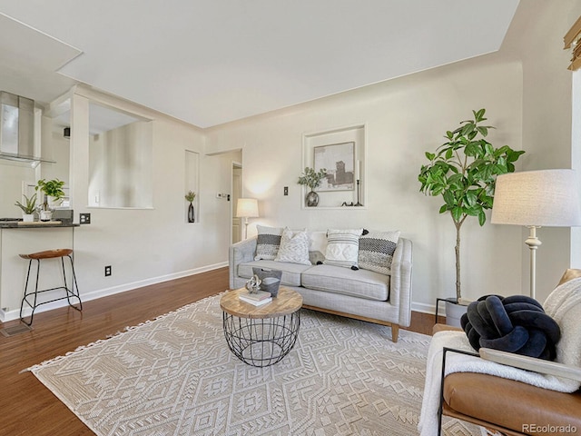 732 Poplar St, Denver, CO 80220 - living area with wood finished floors and baseboards