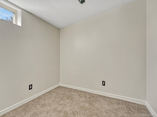 732 Poplar St, Denver, CO 80220 - carpeted empty room featuring baseboards