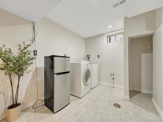 732 Poplar St, Denver, CO 80220 - washroom with washing machine and clothes dryer, baseboards, and recessed lighting