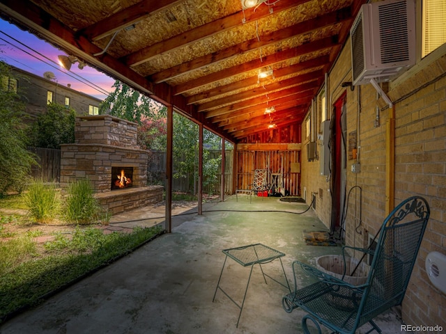 732 Poplar St, Denver, CO 80220 - fenced backyard with an outdoor stone fireplace and a patio
