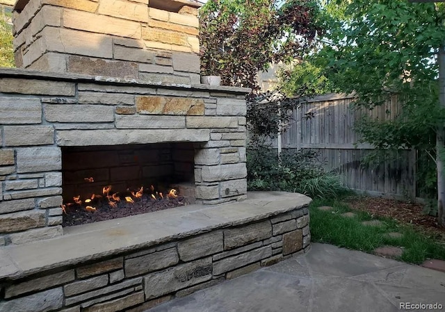 732 Poplar St, Denver, CO 80220 - detailed view of an outdoor stone fireplace