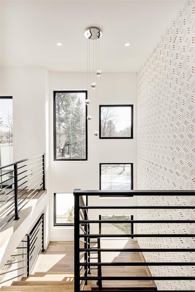 stairway featuring hardwood / wood-style floors