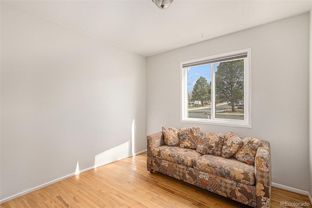 2514 E Bijou St, Colorado Springs, CO 80909 - sitting room with light wood-style floors and baseboards