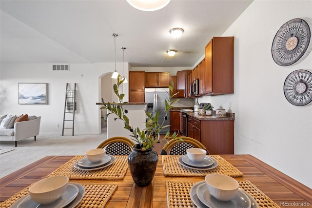 view of carpeted dining room