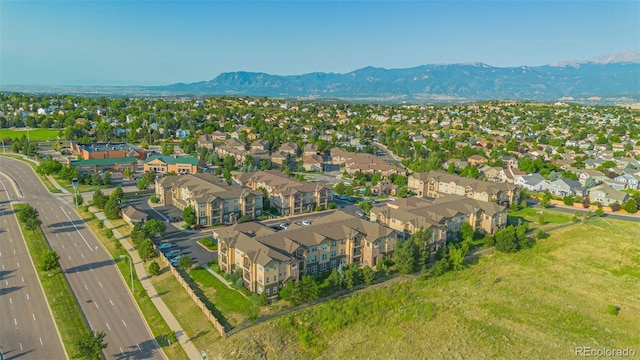 bird's eye view with a mountain view