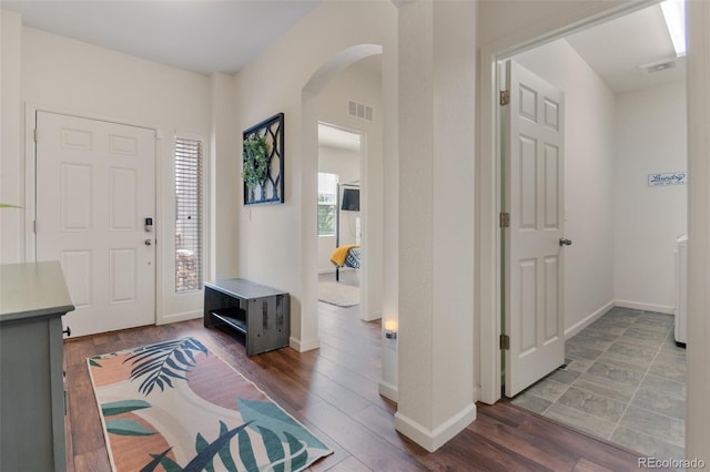 foyer with wood-type flooring