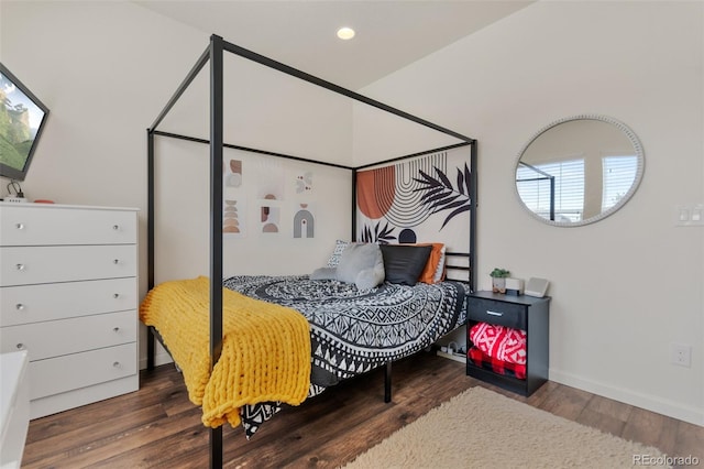 bedroom with recessed lighting, baseboards, and wood finished floors