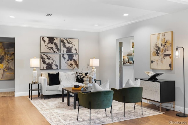 1590 Little Raven St Unit 408, Denver, CO 80202 - living area featuring crown molding, recessed lighting, and wood finished floors