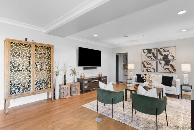 1590 Little Raven St Unit 408, Denver, CO 80202 - living room featuring recessed lighting, baseboards, visible vents, crown molding, and wood finished floors
