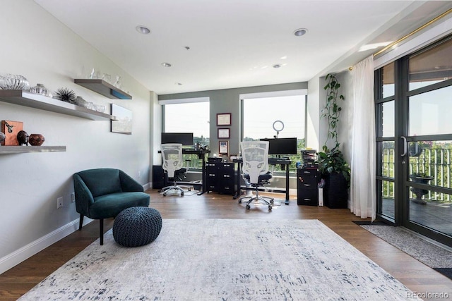 1590 Little Raven St Unit 408, Denver, CO 80202 - home office featuring recessed lighting, baseboards, and wood finished floors